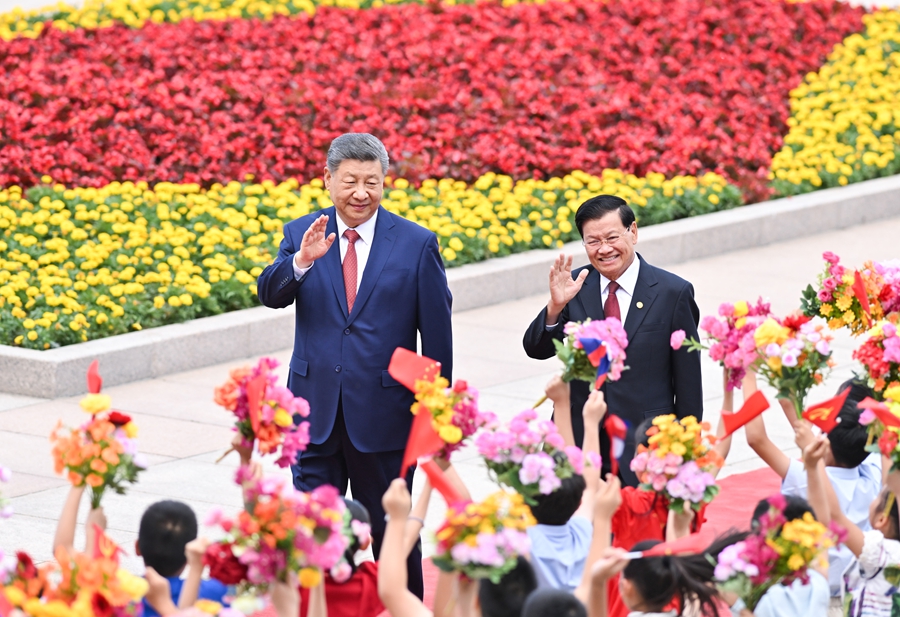 习近平同老挝人民革命党中央总书记、国家主席通伦举行会谈